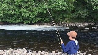 Young lad fishing the Naver